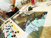 4985631 Tesla vs. Edison: Powering Up!