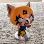 5636027 Funkoverse Strategy Game: Aggretsuko 100